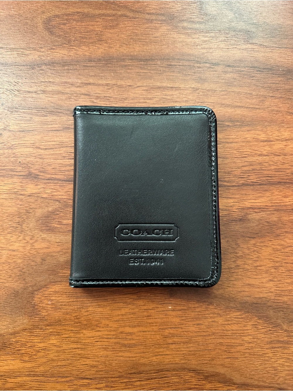 Coach Black Leather Wallet with Embossed Logo